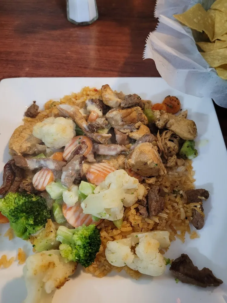 Steak and Chicken Medley with Broccoli Cauliflower Carrots and Creamy Queso